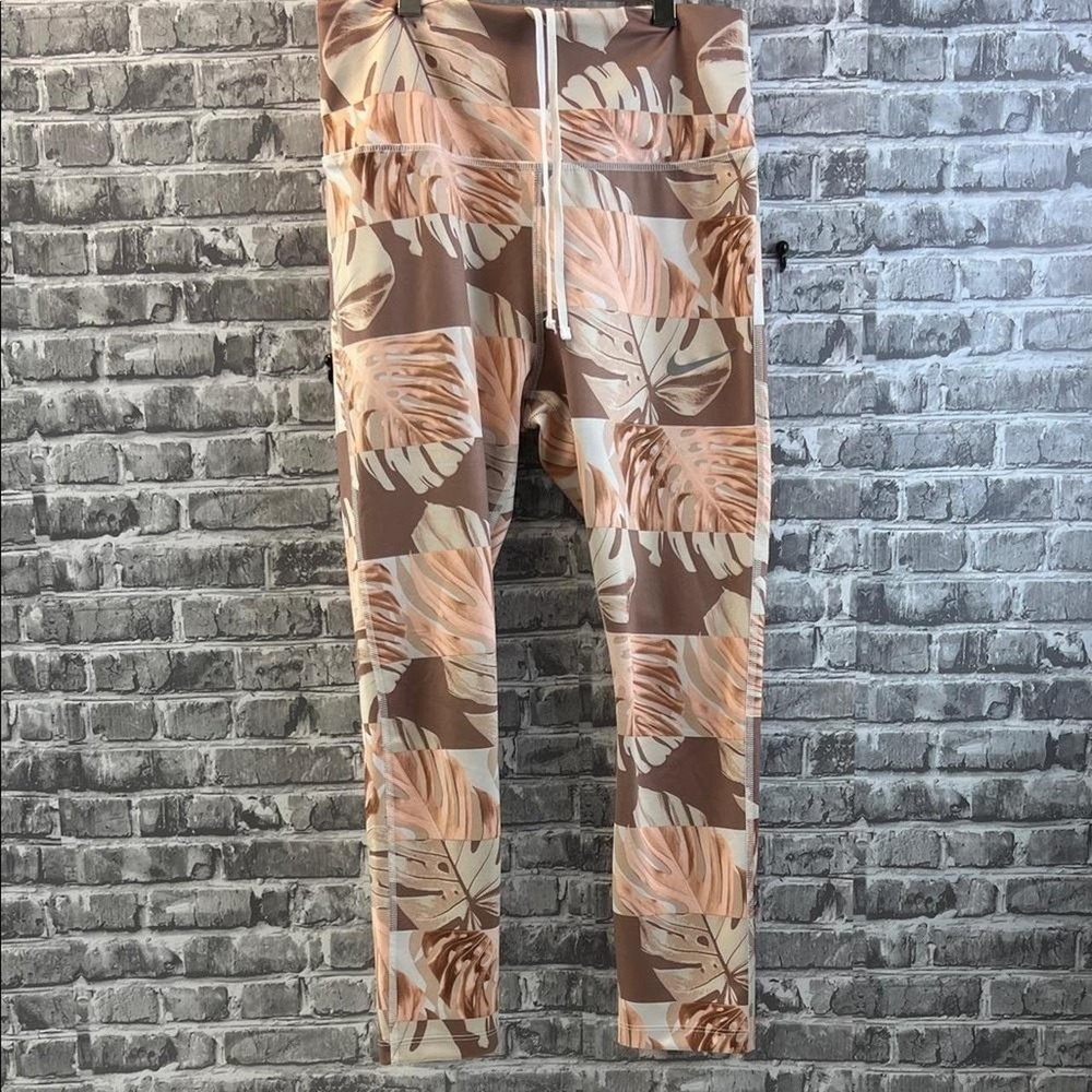 Nike brown and cream monstera botanical print legging pants running medium